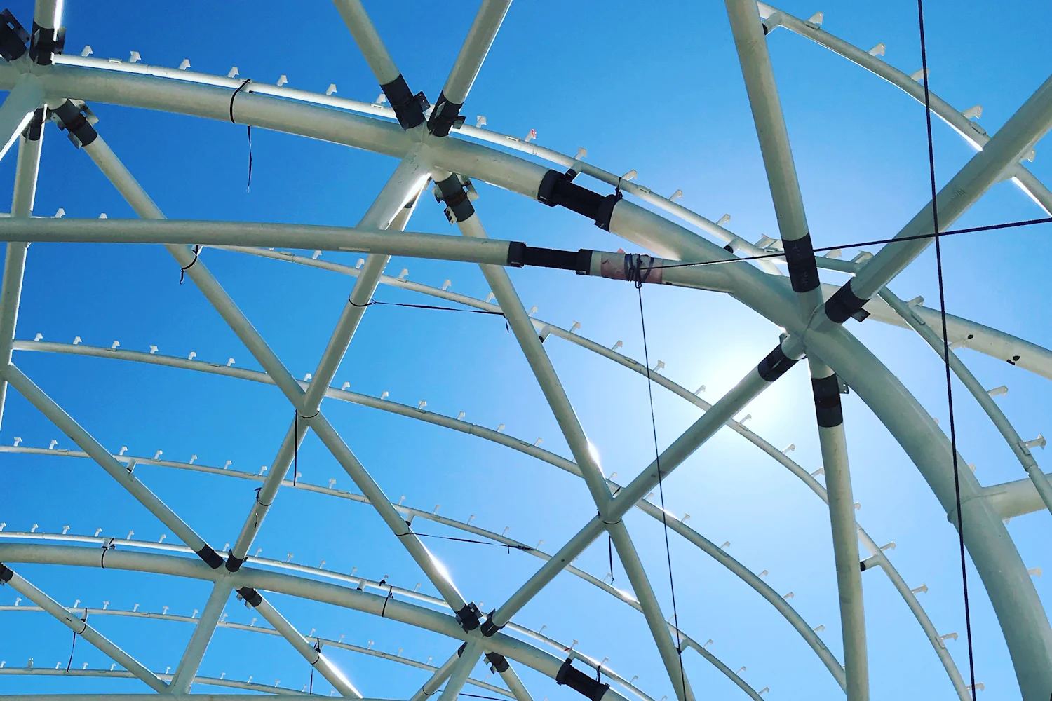 Steel roof structure of an airport terminal under construction — airport due diligence Ukraine